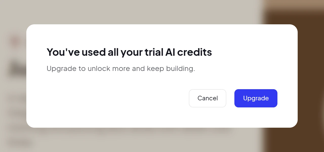 A panel reading You've used all your trial AI credits, Upgrade to unlock more and keep building, with Cancel and Upgrade buttons