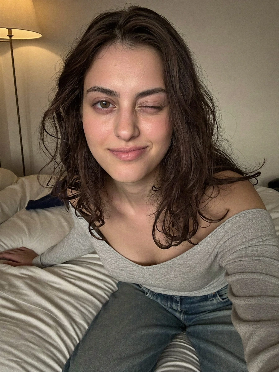 Aisha custom photo, a selfie with a wink