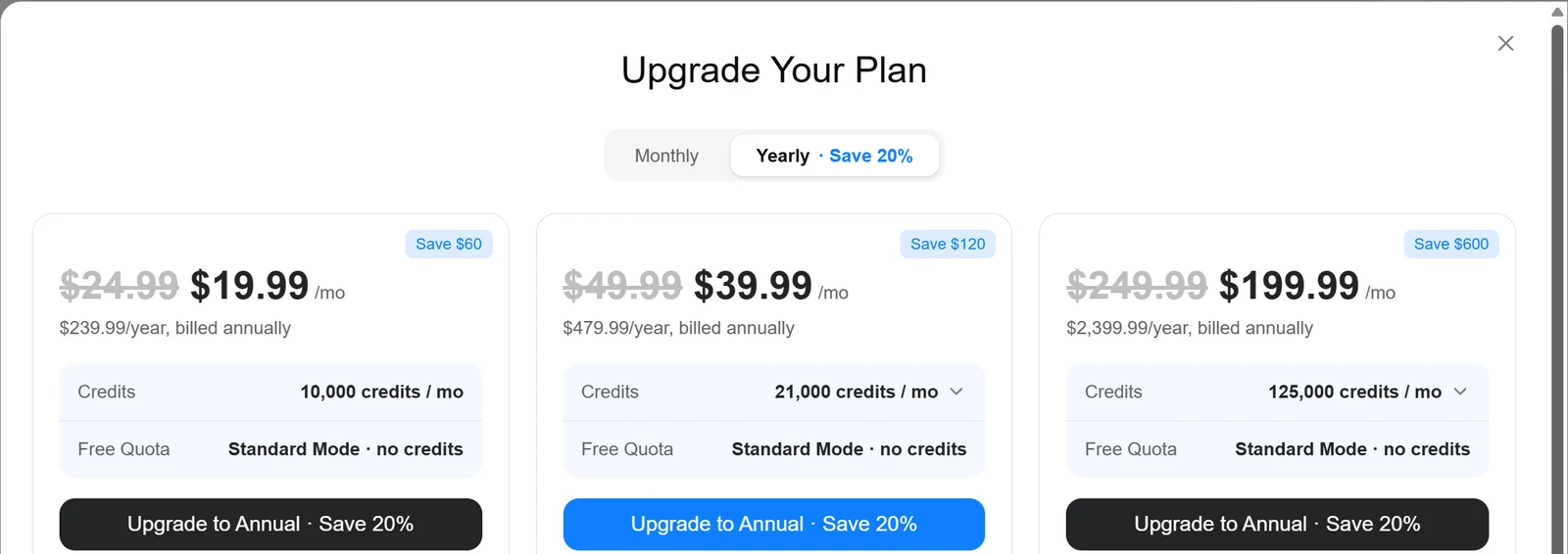 Genspark plan cards for Plus, a middle plan and Pro, each with its monthly credits and a yearly saving