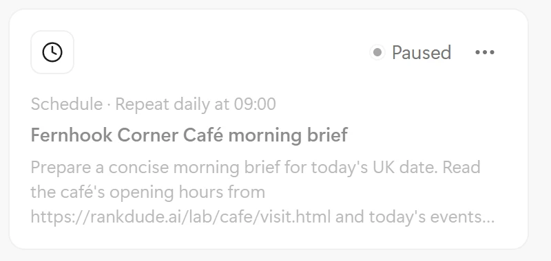 Manus Automations list showing a scheduled task named Fernhook Corner Café morning brief, repeat daily at 09:00, marked Paused