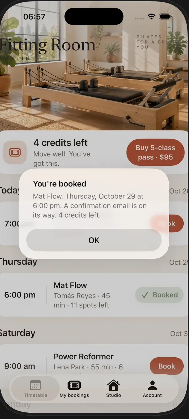 Phone screenshot of the Fitting Room app with a message: You're booked, Mat Flow, Thursday, October 29 at 6:00 pm, a confirmation email is on its way, 4 credits left