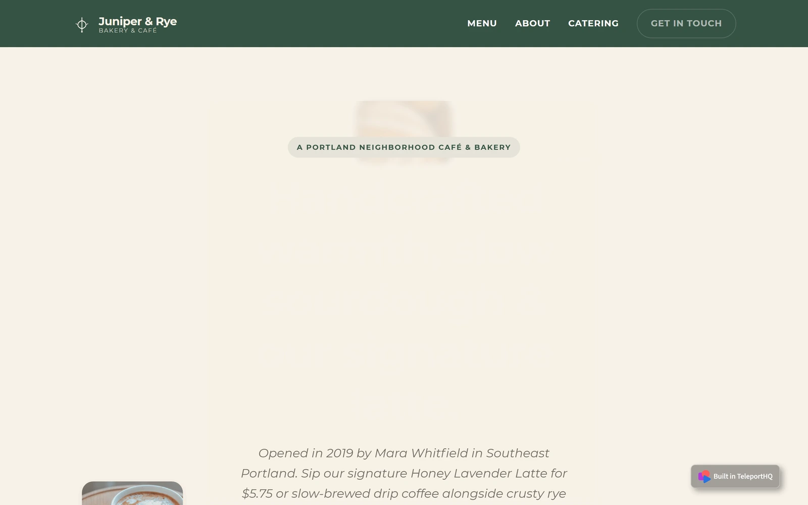The cafe home page on a desktop screen with a green menu bar and a cream page where the large headline is too pale to read